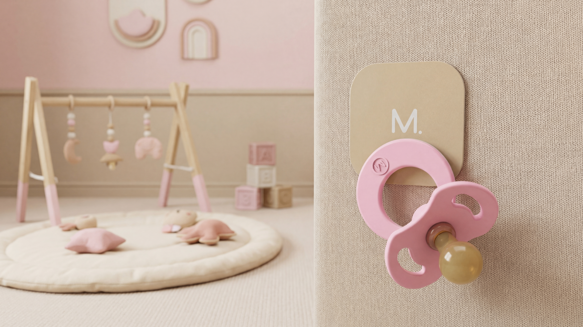 Magnetot pastel pink magnetic pacifier on a tile in a nursery